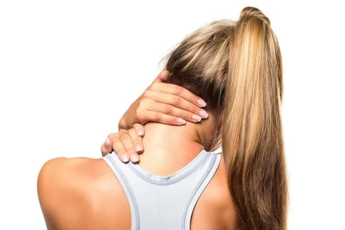 Woman with neck pain before seeing Clayton Chiropractor