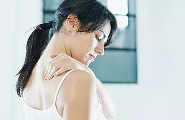 Woman suffering from shoulder pain