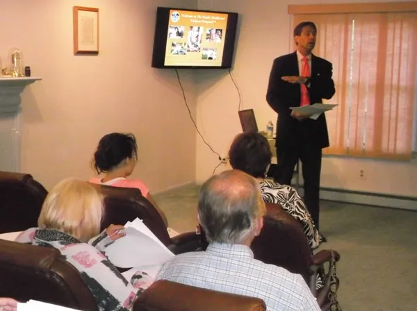 Dr pfeiffer speaking to a crowd