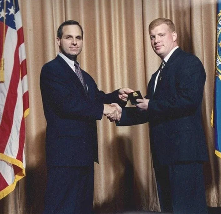 MR. SHIPLEY GRADUATING FROM THE FBI ACADEMY IN 1996.