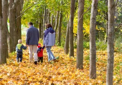 Family walking in fall scene