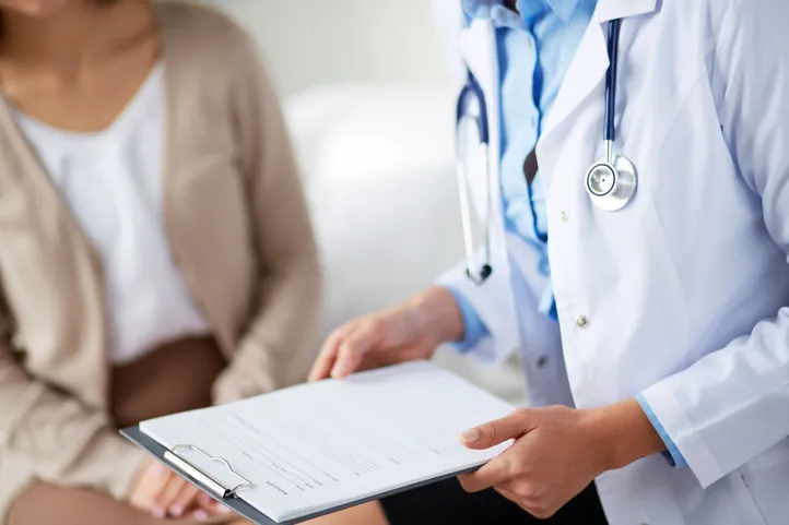 Doctor working with patient