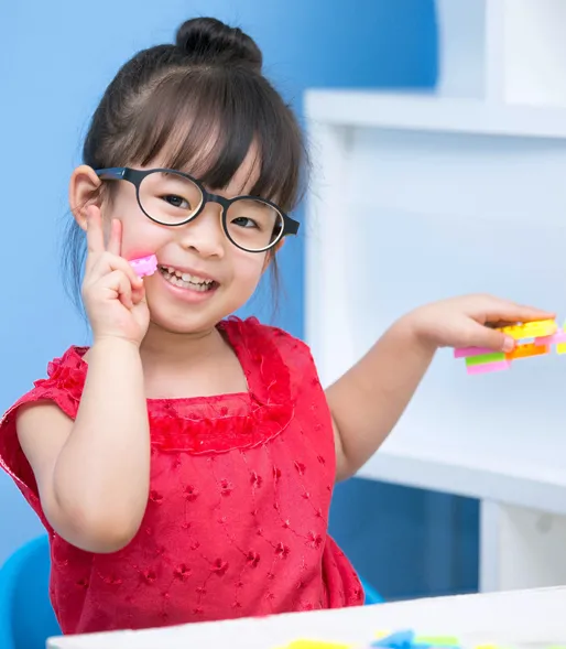 little girl with glasses