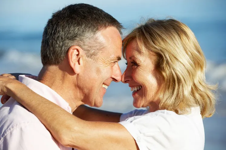 middle age couple on beach