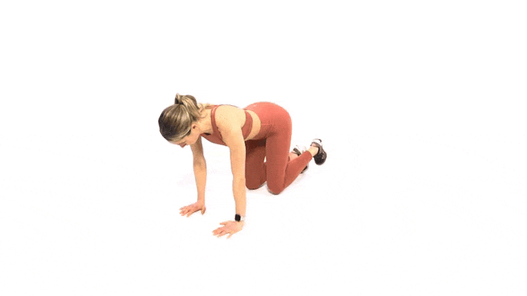 A woman doing quadruped hip half-circle exercises.