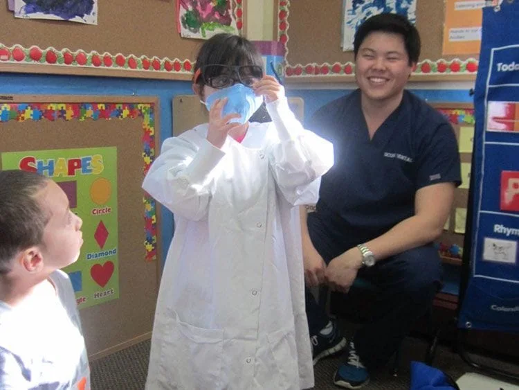 Dr. Jeffrey Pan doing children's dental checkups in Melrose, MA