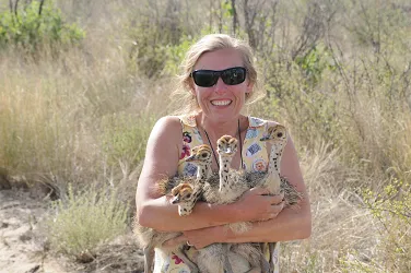 Dr. Schroeder with Ostrich babies.