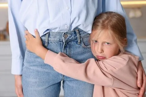 Child showing signs of separation anxiety