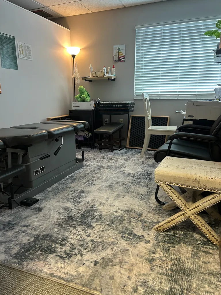Patient treatment room at Bukaty Family Chiropractic with chiropractic table and calm setting.