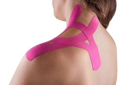 Kinesiology tape on a woman's left shoulder