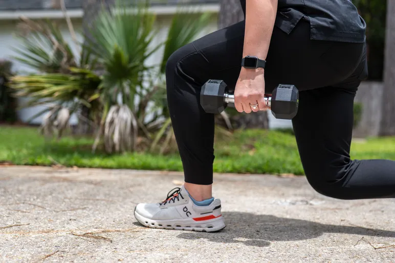 Women with nutritious food in kitchen