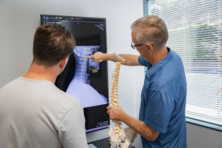 Doctor with patient xray