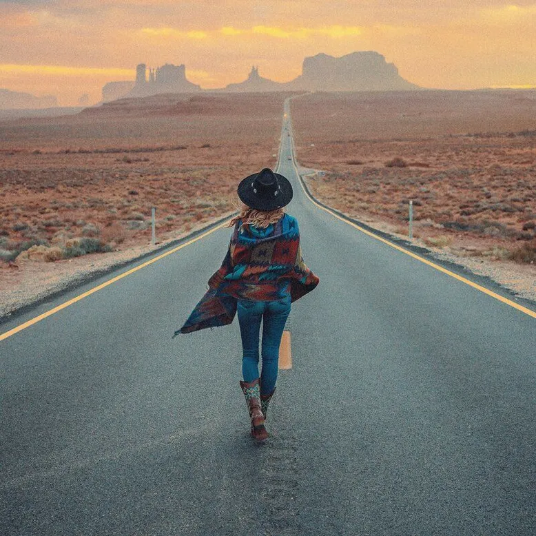 individual walking on a road