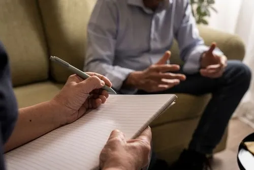 Man during DOT SAP evaluation with therapist