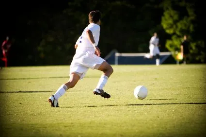 Kid playing soccer