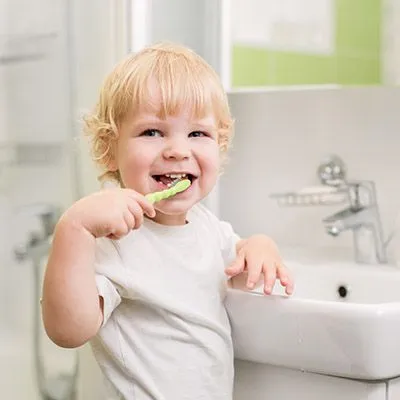 Boy brushing teeth