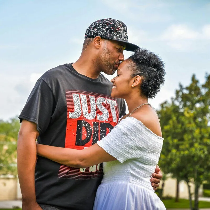 couple forehead kiss