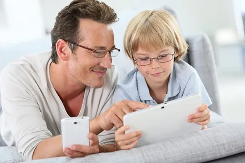 father and son playing a game