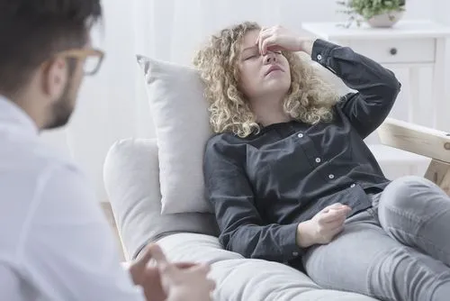 Client lying down and feeling lightheaded during trauma therapy.