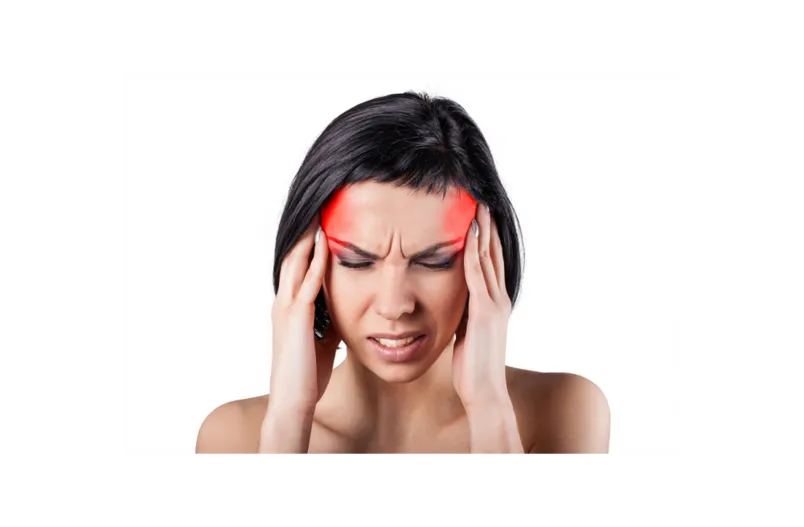 woman with headache or migraine before seeing a chiropractor in Clayton