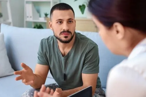 Veteran receiving PTSD therapy from mental health professional