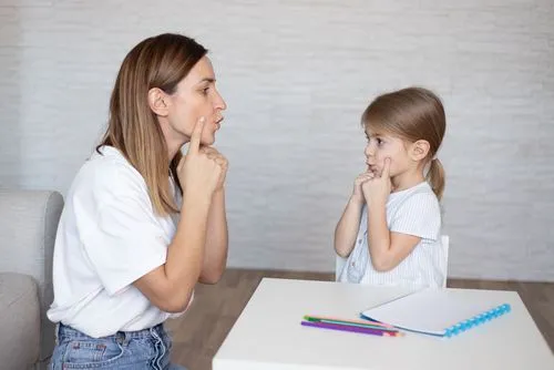 Pediatric patient receiving speech therapy for speech delay