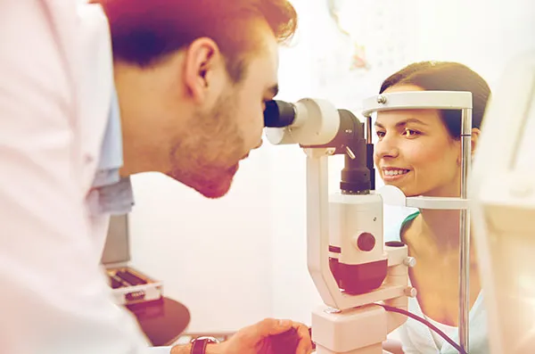 woman getting eye exam