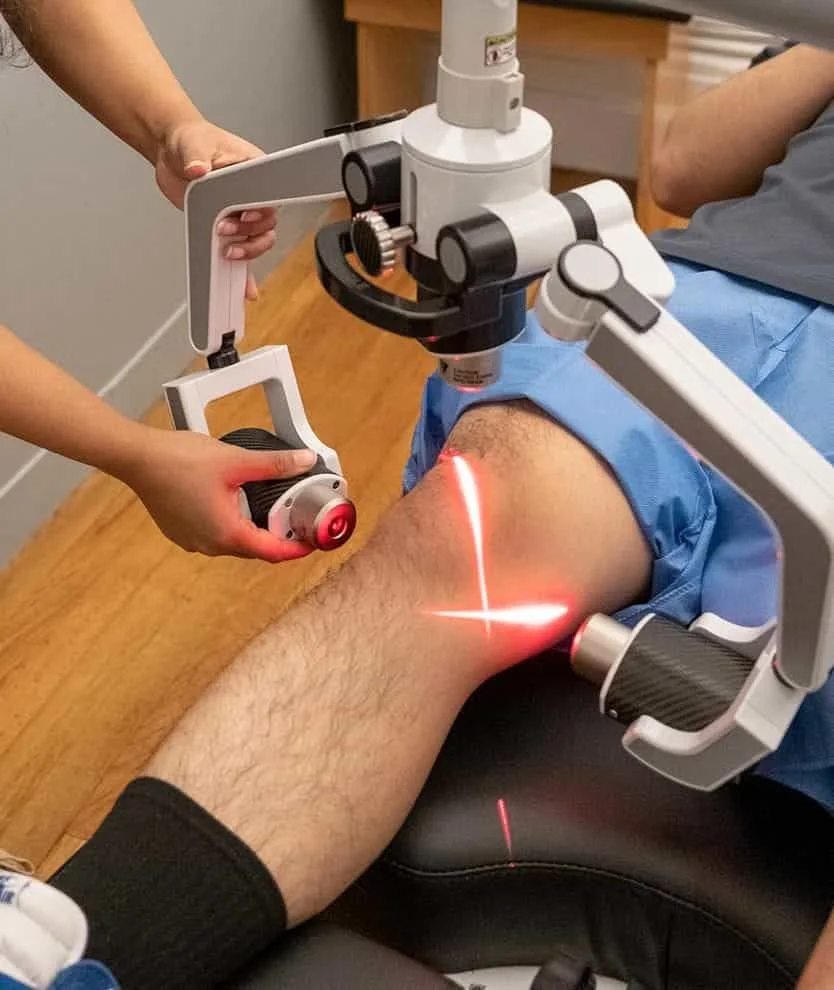 chiropractic treatment for knee pain featuring low level laser therapy 
