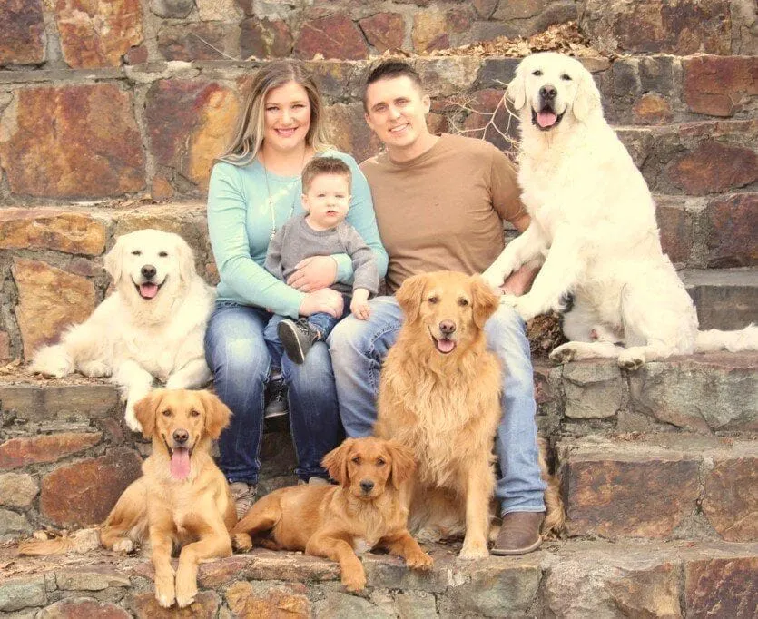 Kamri, her family (husband and son) and her five dogs