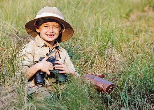 Safari boy with binoculars