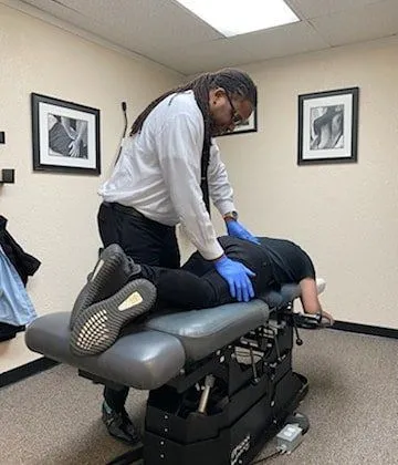 Dr Bain Adjusting a Patient