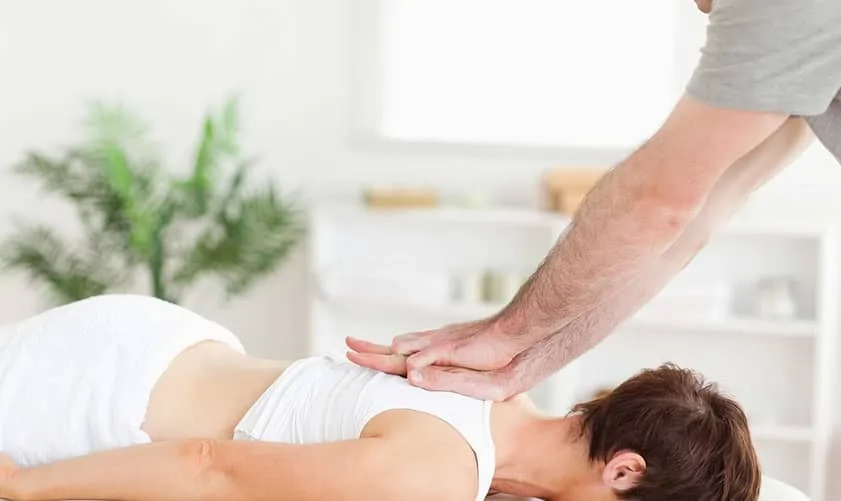 Woman Getting Chiropractic Care