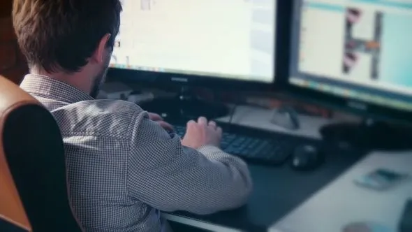 Man sitting at his computer