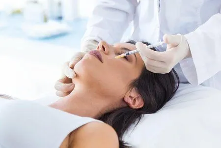dentist injecting botox into woman's face, Botox treatment Cockeysville dentist