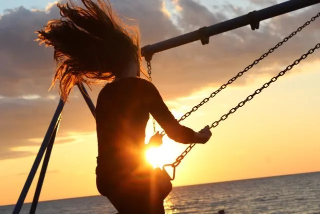 Woman On Swing