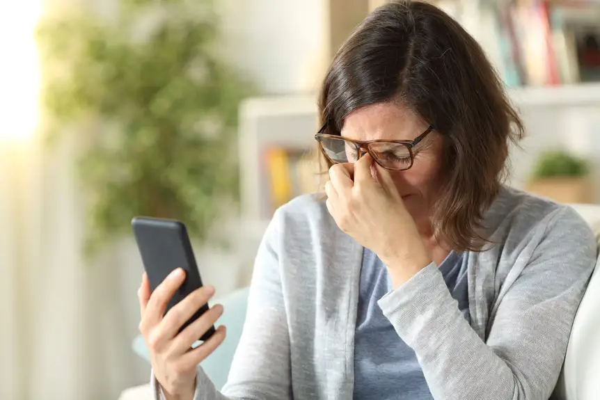 adult-woman-suffers-eyestrain-eyeglasses-holding