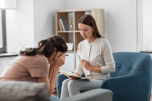 Woman attending stress management therapy session