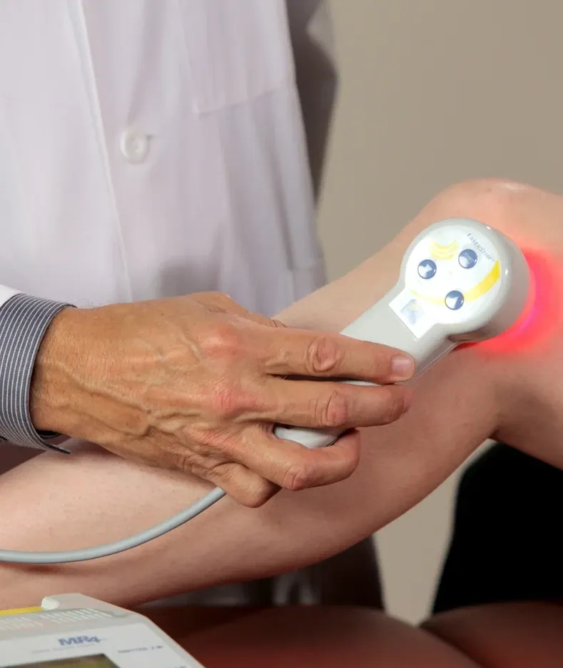 Doctor using laser treatment
