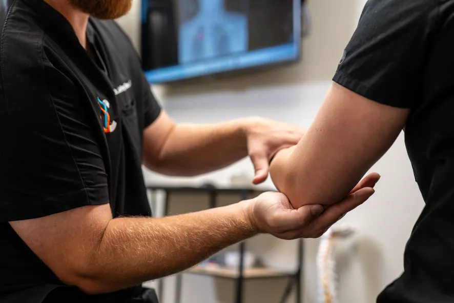 Doctor examining knee