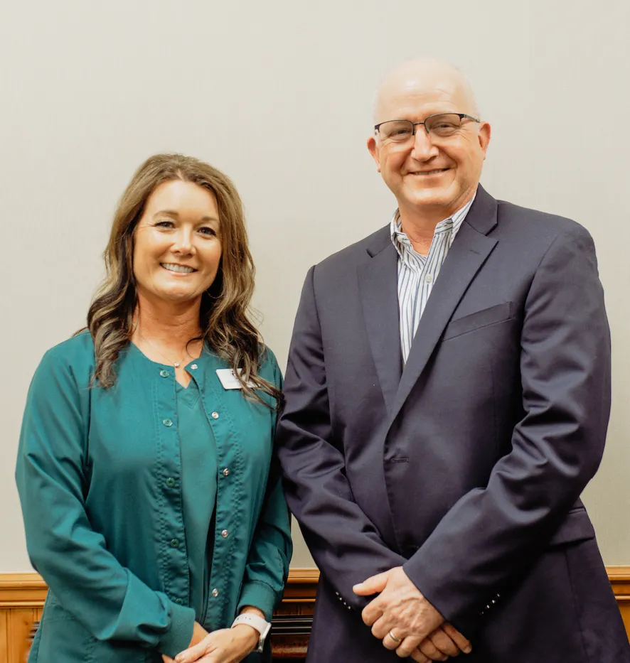 Sherry Duhon, RDH and Joseph Holcomb, DDS inside the office of Crockett Dental Care.