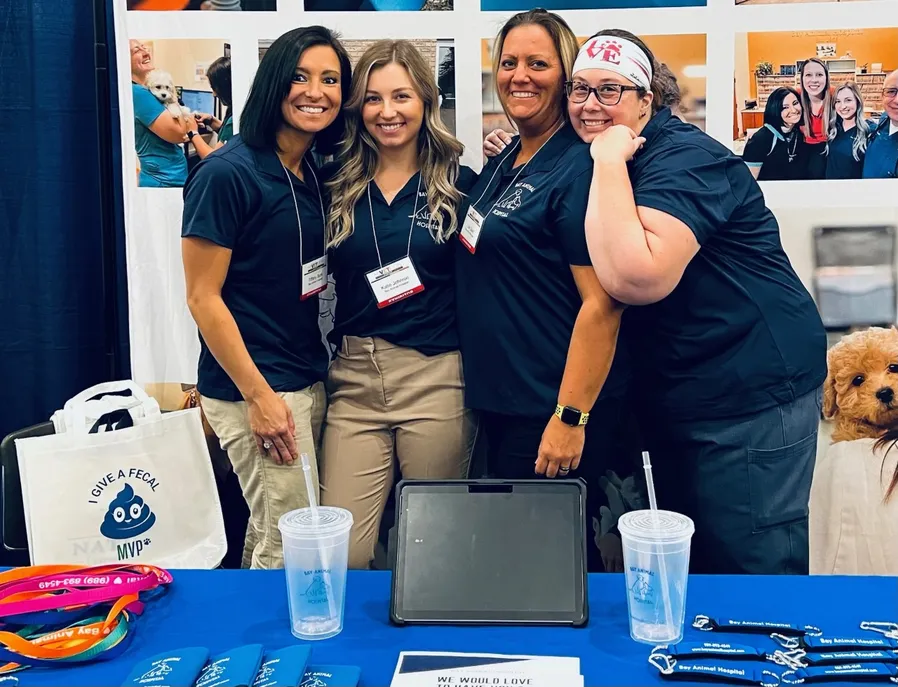 A group of woman at a recruitment table