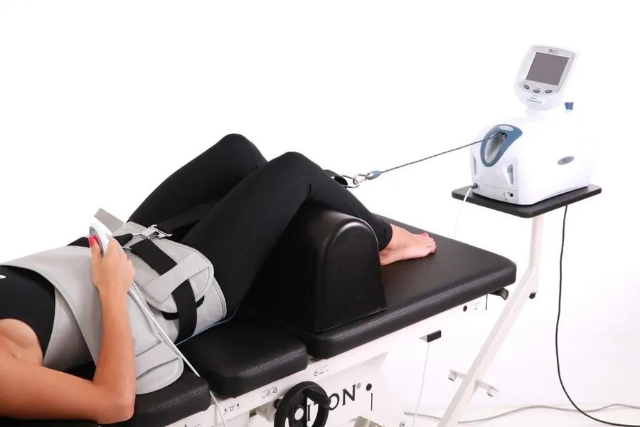A female patient receiving Spinal Decompression Therapy