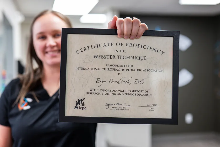 Women holding pregnant belly