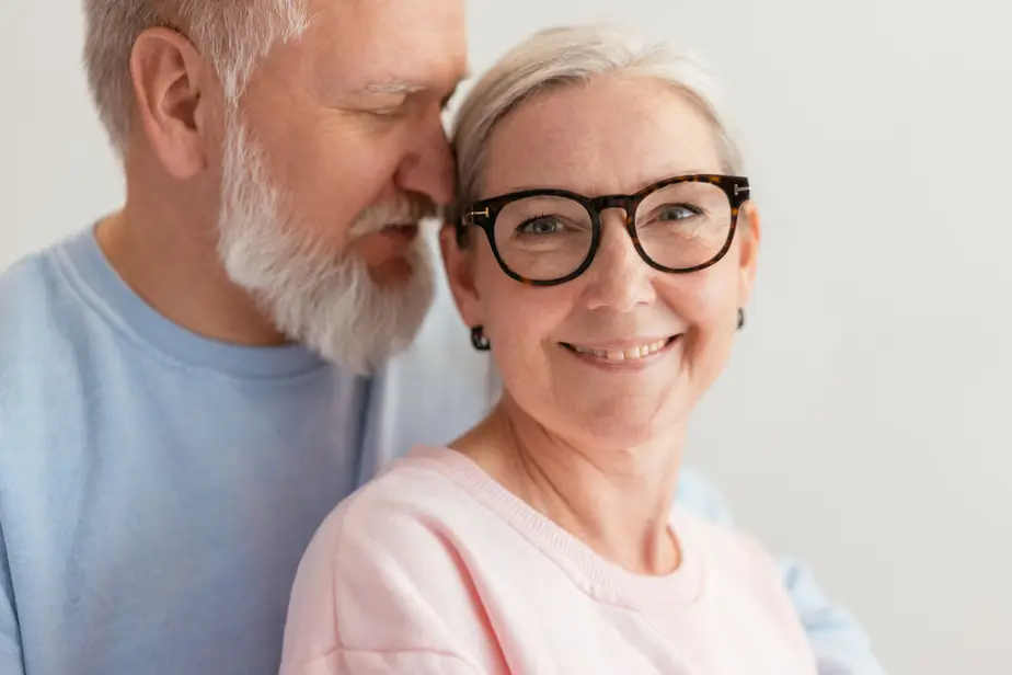 couple with heart hands