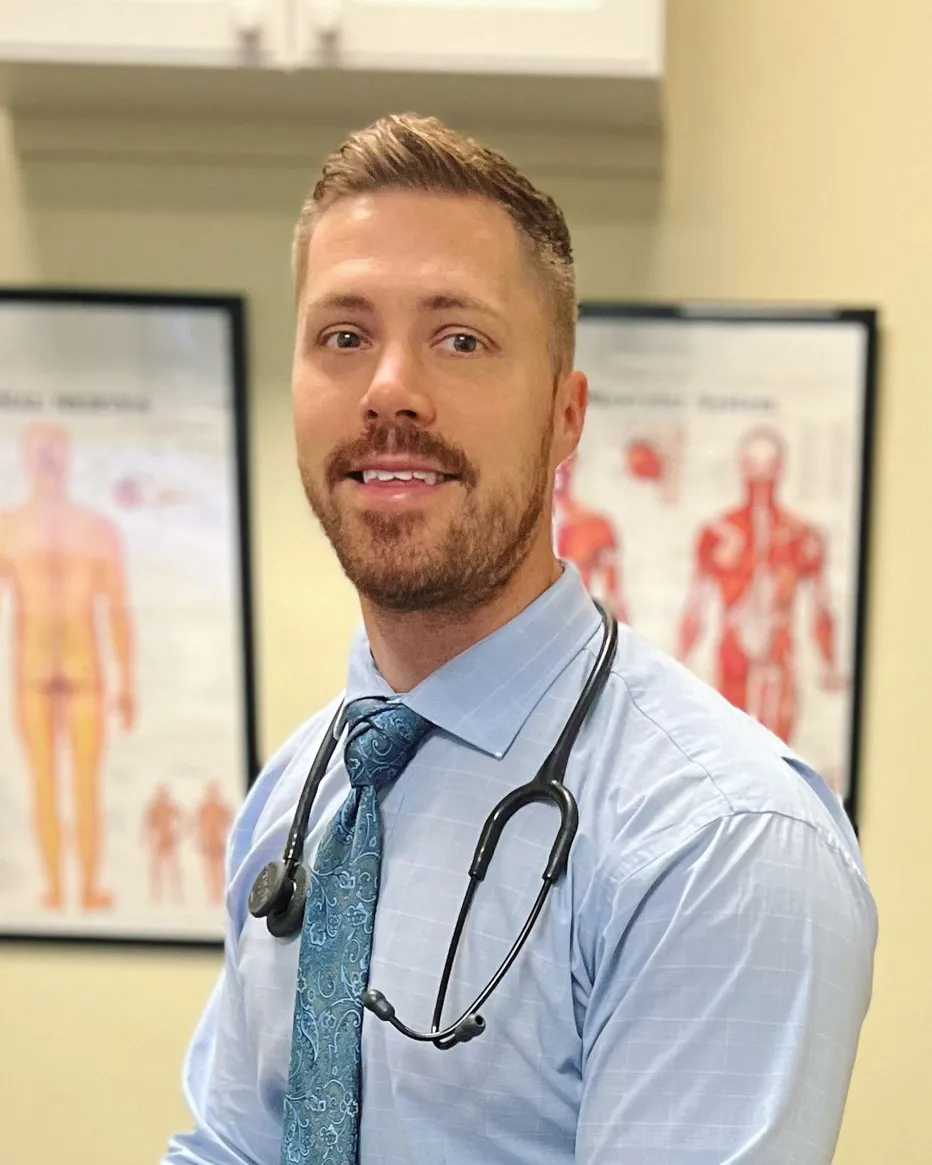 Dr. James Fraser, Palmer Graduate, conducting a comprehensive neuromusculoskeletal examination to audit intersegmental dysfunction at Spine Spot Chiropractic in Basalt, CO