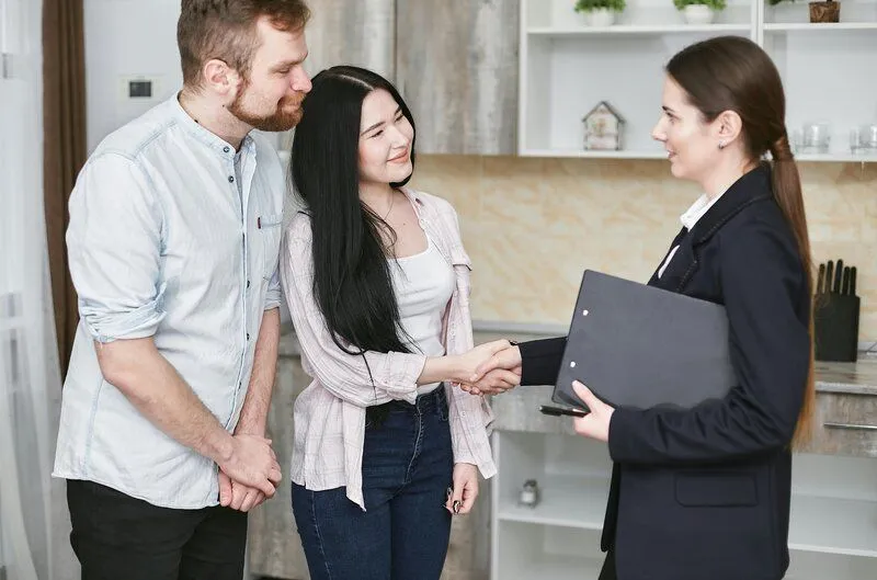 woman greeting clients