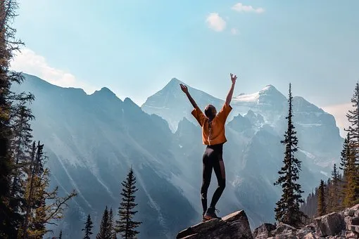 woman standing on a rock