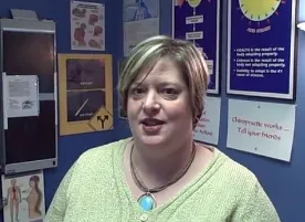 A woman wearing green shirt