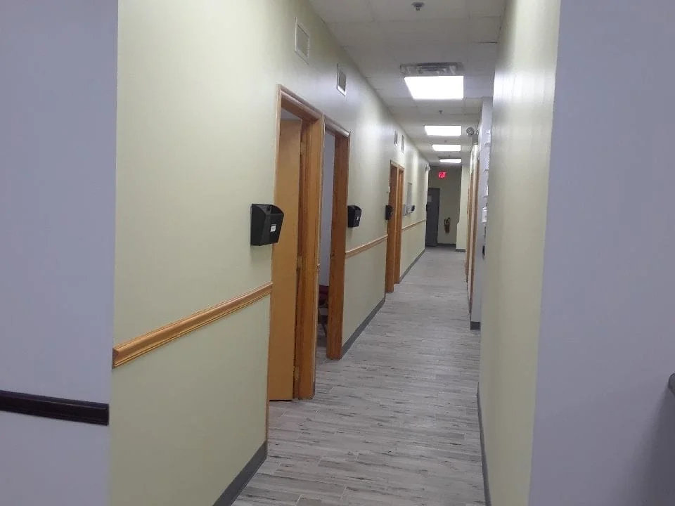 Hallway to our exam rooms, surgery room, laboratory, dental area and grooming/bath room