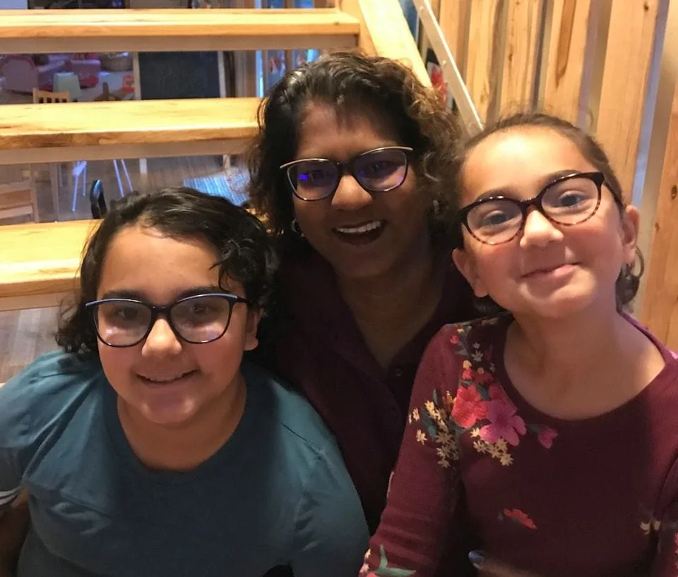 Dr. Elahi-Neal and daughters showing off their Draper James Mommy and Me frames